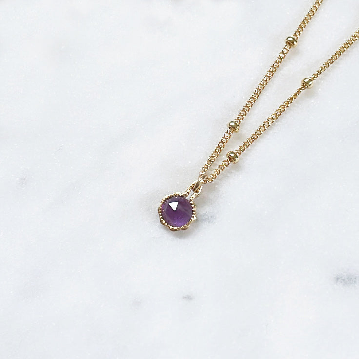 Round Amethyst pendant necklace on a fine gold chain