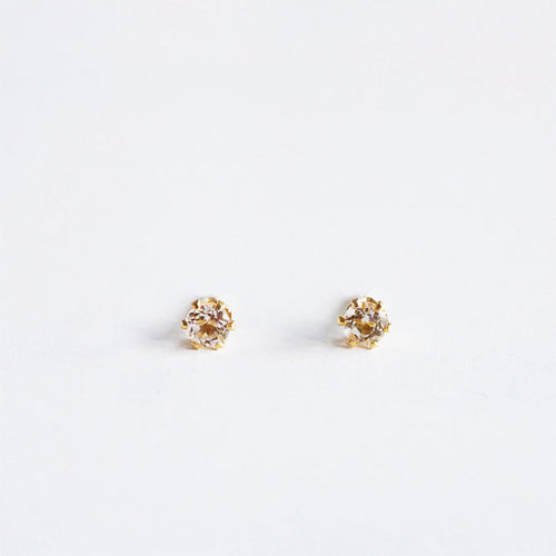 A pair of 3mm citrine gemstone stud earrings in gold