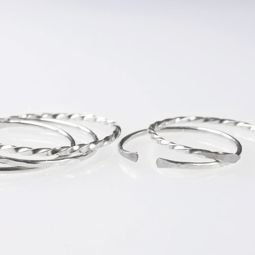 Thin sterling silver ring bands in a classic, hammered and twisted finish - Australian handmade minimalist jewellery